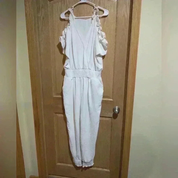 Jumpsuit size Large V-neck pockets elastic waist peekaboo shoulder cream NWOT - Picture 1 of 5